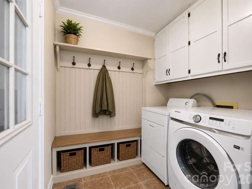131 Fox Runn Drive, Granite Falls, NC 28630.  MLS# CAR4404358, YatesRealty ID 36943. Digitally enhanced laundry area