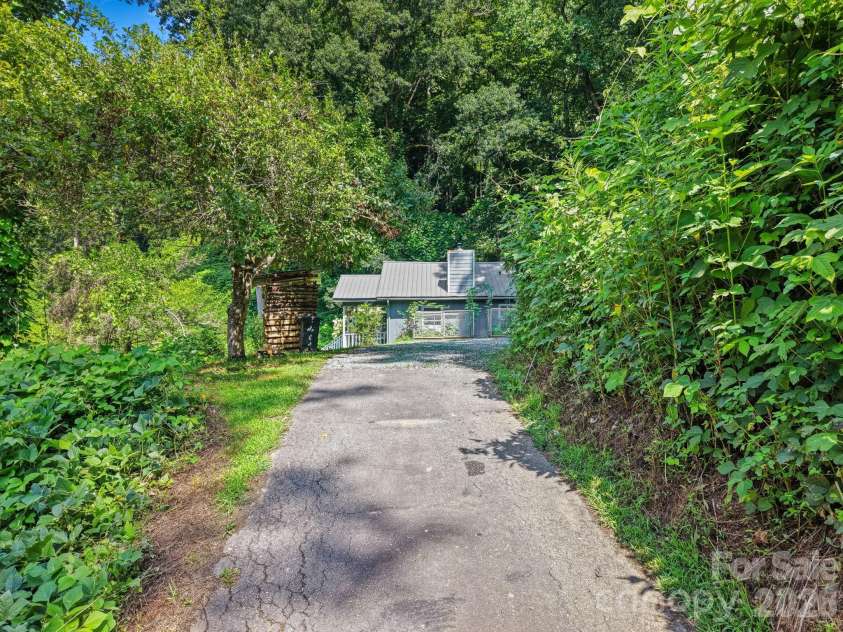 6115 Skyland Drive, Sylva, NC 28779.  MLS# CAR4401474, YatesRealty ID 36944. Driveway Parking