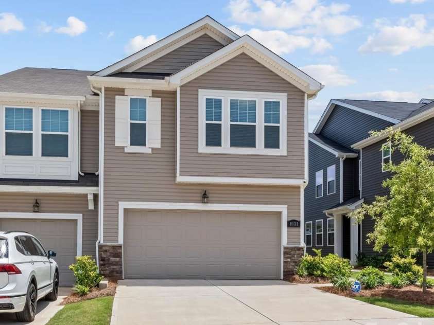 8122 Downy Oak Lane, Charlotte, NC 28269.  MLS# CAR4394900, YatesRealty ID 36945. 2-car garage with storage area