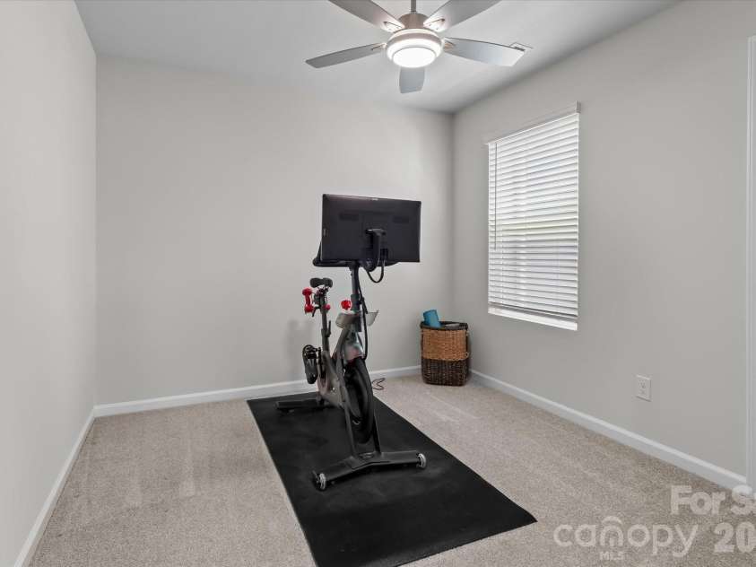 8122 Downy Oak Lane, Charlotte, NC 28269.  MLS# CAR4394900, YatesRealty ID 36945. 3rd Bedroom with ceiling fan