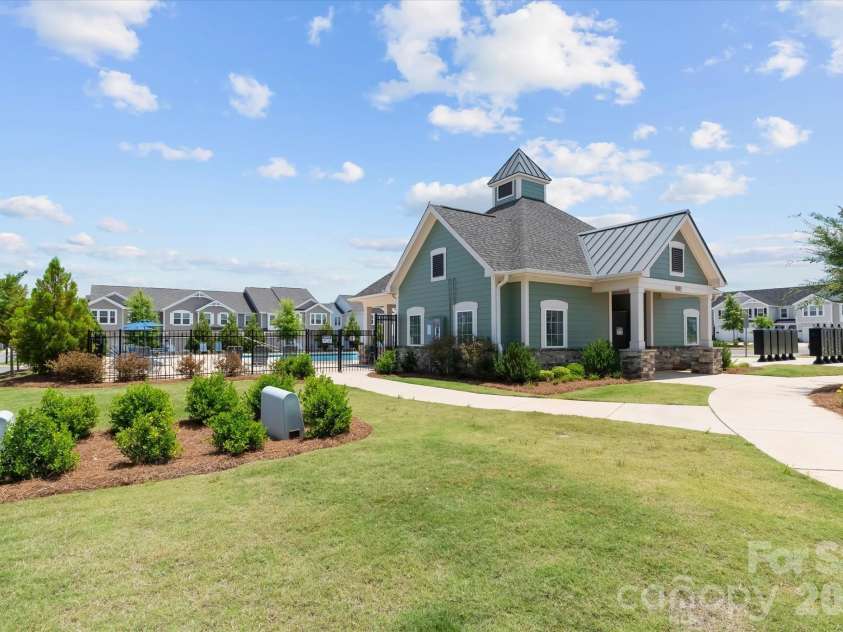8122 Downy Oak Lane, Charlotte, NC 28269.  MLS# CAR4394900, YatesRealty ID 36945. Second clubhouse and pool just one street over from townhome