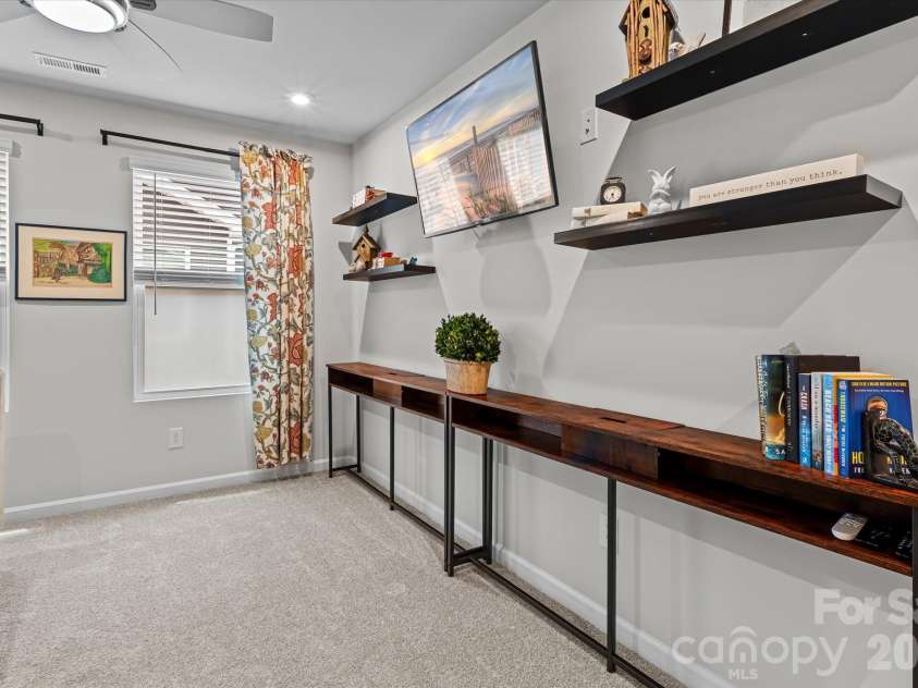 8122 Downy Oak Lane, Charlotte, NC 28269.  MLS# CAR4394900, YatesRealty ID 36945. Versatile Loft/flex space