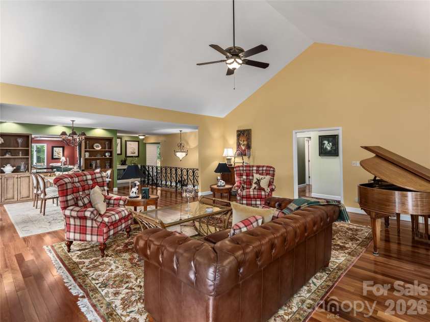 1071 Linkside Drive, Hendersonville, NC 28739.  MLS# CAR4400634, YatesRealty ID 36946. Open floorplan surrounded by Sliding French Doors and decking