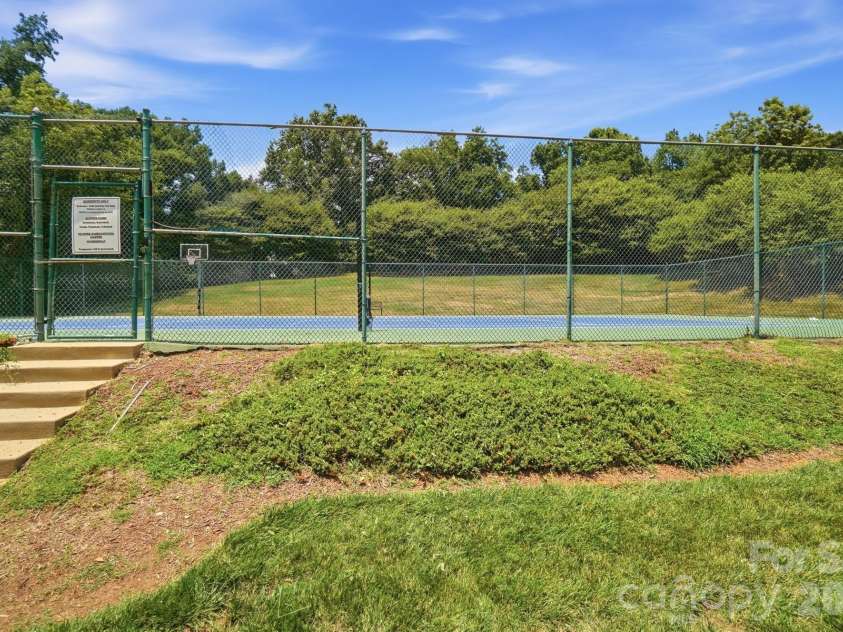 6017 Colton Ridge Drive, Indian Trail, NC 28079.  MLS# CAR4401537, YatesRealty ID 36949. Community Tennis Court