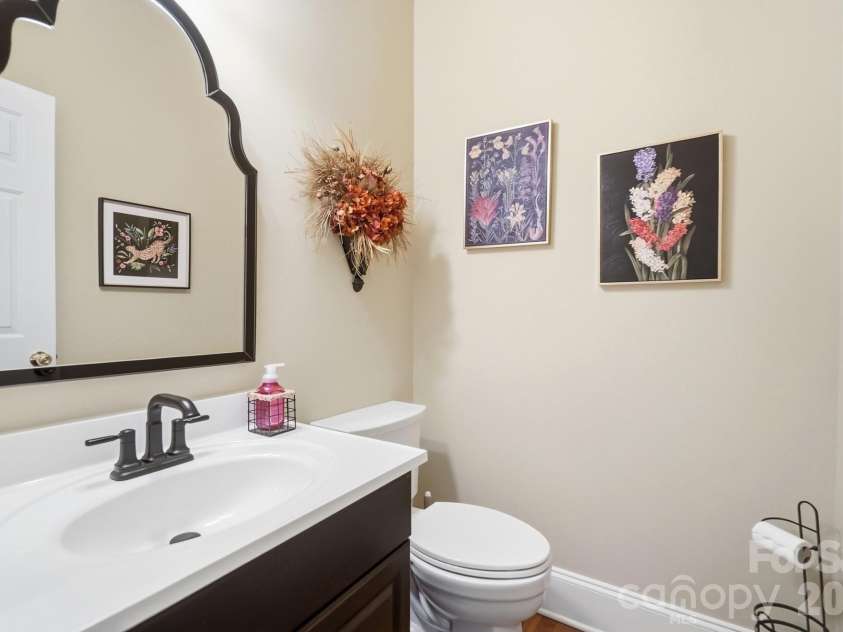 6017 Colton Ridge Drive, Indian Trail, NC 28079.  MLS# CAR4401537, YatesRealty ID 36949. Half Bath on Main