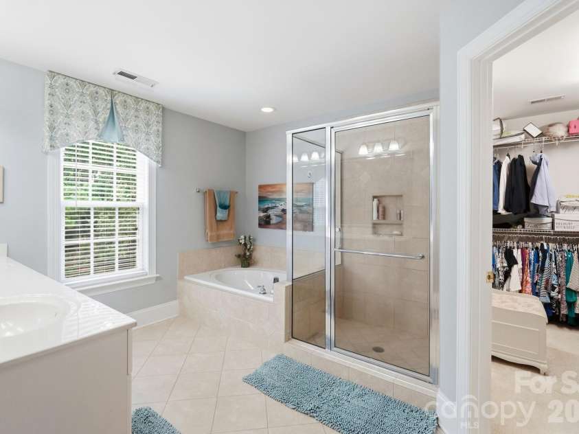 6017 Colton Ridge Drive, Indian Trail, NC 28079.  MLS# CAR4401537, YatesRealty ID 36949. Primary Ensuite on Second Level