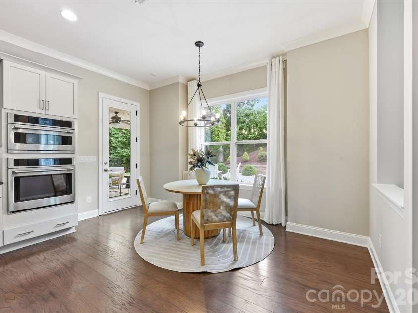 18314 Doves Crest Road, Cornelius, NC 28031.  MLS# CAR4397375, YatesRealty ID 36956. Breakfast nook overlooking the pool
