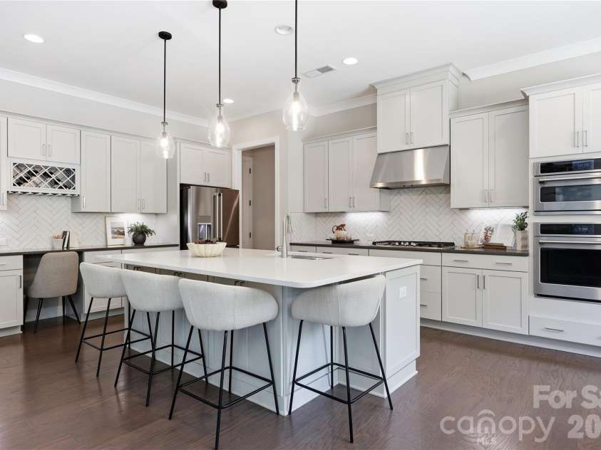 18314 Doves Crest Road, Cornelius, NC 28031.  MLS# CAR4397375, YatesRealty ID 36956. Expansive island, perfect for entertaining