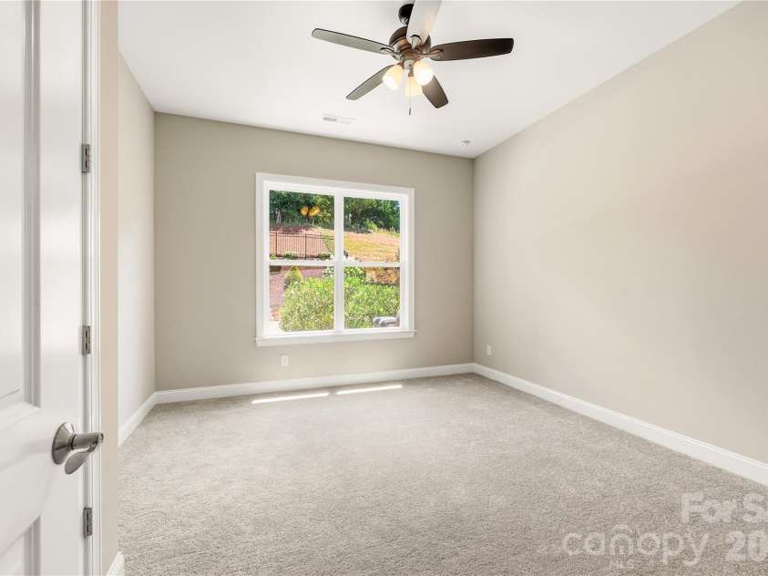 18314 Doves Crest Road, Cornelius, NC 28031.  MLS# CAR4397375, YatesRealty ID 36956. Secondary bedroom