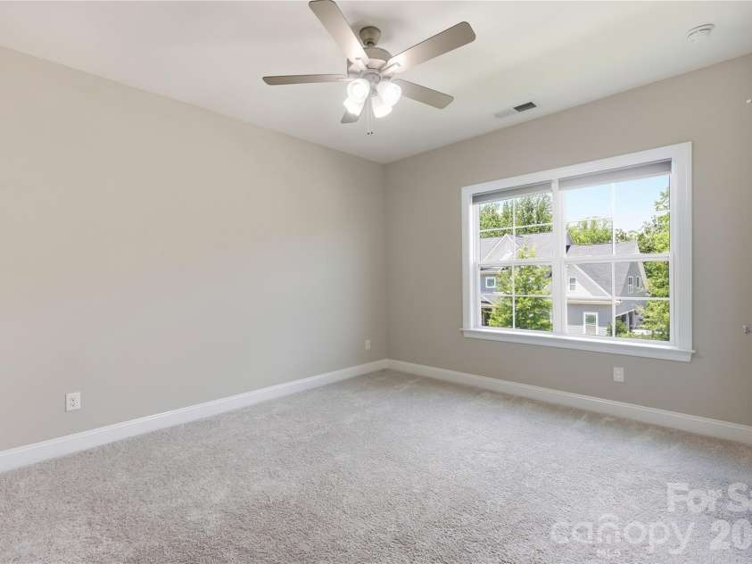 18314 Doves Crest Road, Cornelius, NC 28031.  MLS# CAR4397375, YatesRealty ID 36956. Secondary bedroom