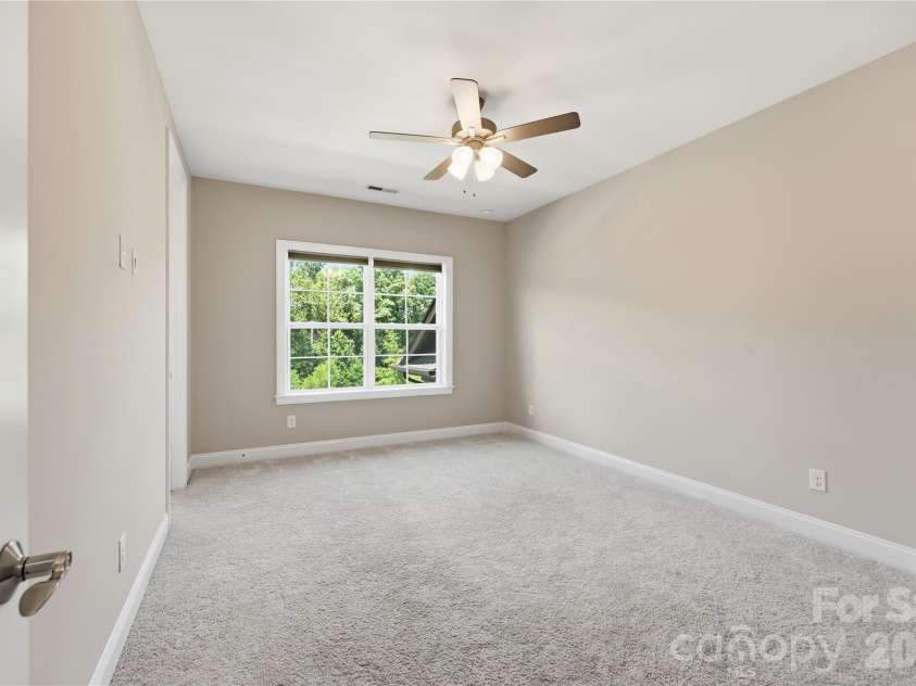 18314 Doves Crest Road, Cornelius, NC 28031.  MLS# CAR4397375, YatesRealty ID 36956. Secondary bedroom