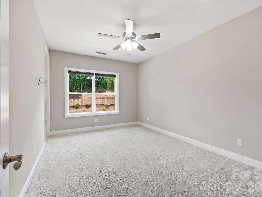 18314 Doves Crest Road, Cornelius, NC 28031.  MLS# CAR4397375, YatesRealty ID 36956. Secondary bedroom