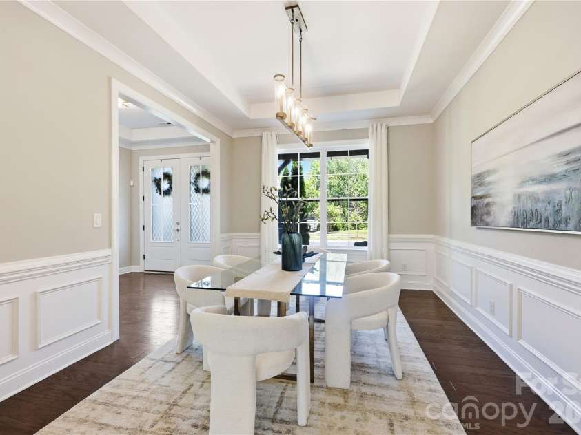 18314 Doves Crest Road, Cornelius, NC 28031.  MLS# CAR4397375, YatesRealty ID 36956. Spacious formal dining with moulding detail