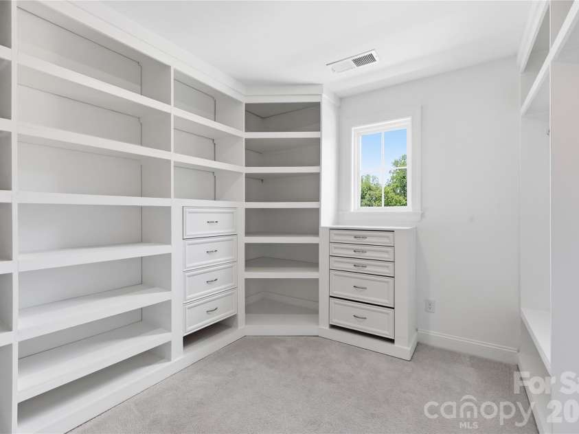 18314 Doves Crest Road, Cornelius, NC 28031.  MLS# CAR4397375, YatesRealty ID 36956. Two primary closets