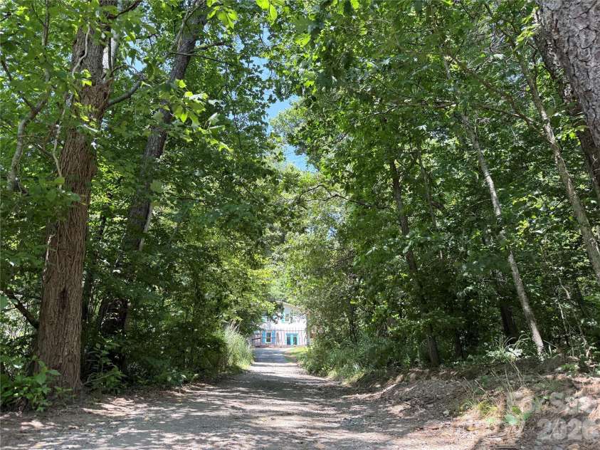 95 Walker Cove Road, Black Mountain, NC 28711.  MLS# CAR4385483, YatesRealty ID 36958. Private Drive!