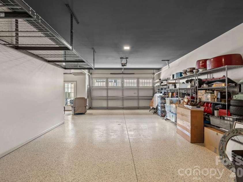 473 Main Street, Davidson, NC 28036.  MLS# CAR4403660, YatesRealty ID 36959. Basement Level Temp Controlled Garage, Epoxy and Elevator