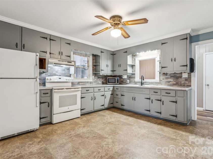 5650 Bertie Avenue, Salisbury, NC 28147.  MLS# CAR4346042, YatesRealty ID 3696. Kitchen with passthrough window