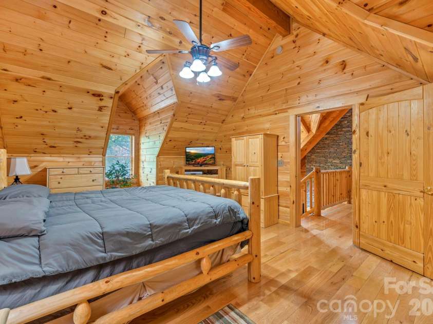 328 Nile Park Drive, Blowing Rock, NC 28605.  MLS# CAR4388511, YatesRealty ID 36961. First upper-level  bedroom