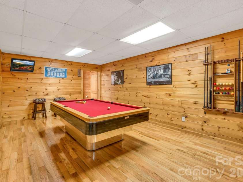 328 Nile Park Drive, Blowing Rock, NC 28605.  MLS# CAR4388511, YatesRealty ID 36961. Lower-level game room