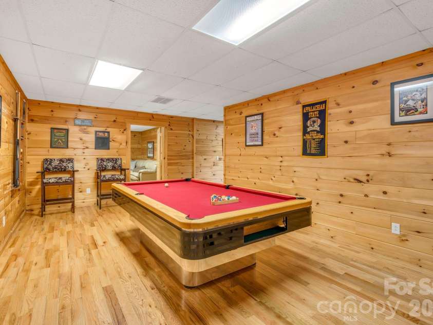 328 Nile Park Drive, Blowing Rock, NC 28605.  MLS# CAR4388511, YatesRealty ID 36961. Lower-level game room