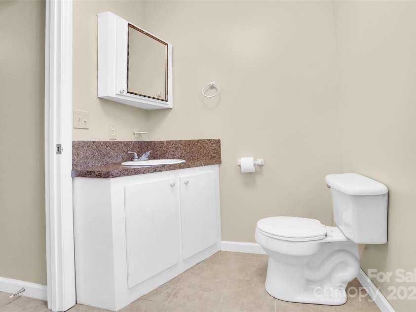 7921 Fairmont Drive, Waxhaw, NC 28173.  MLS# CAR4220531, YatesRealty ID 3697. Guest house bath