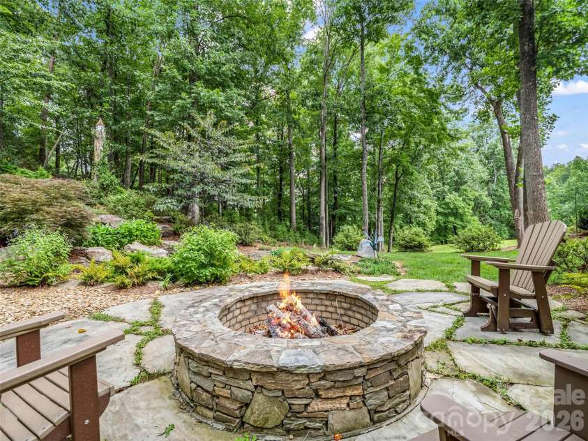 153 Glenn Court, Mill Spring, NC 28756.  MLS# CAR4404140, YatesRealty ID 36970. Fire AI Generated
