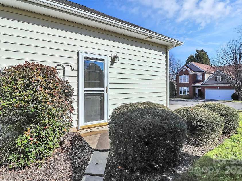3229 Sapphire Lane, Fort Mill, SC 29708.  MLS# CAR4220296, YatesRealty ID 3698. Side door to garage