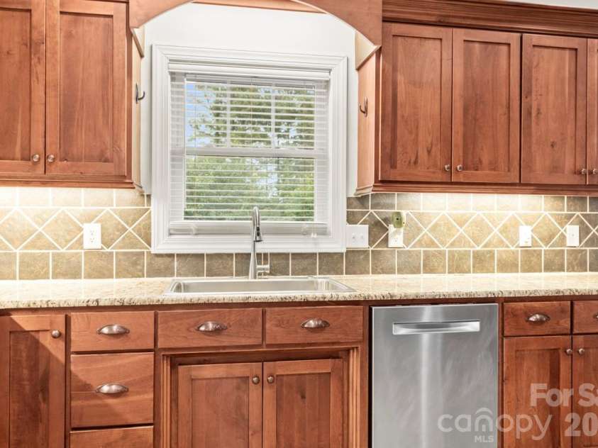 557 Luther Drive, Iron Station, NC 28080.  MLS# CAR4352415, YatesRealty ID 3698. 