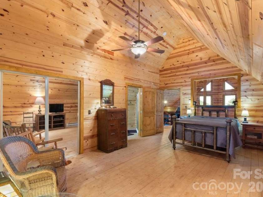 4435 Flat Mountain Road, Highlands, NC 28741.  MLS# CAR4402768, YatesRealty ID 36981. Primary Ensuite Bedroom on Upper Level
