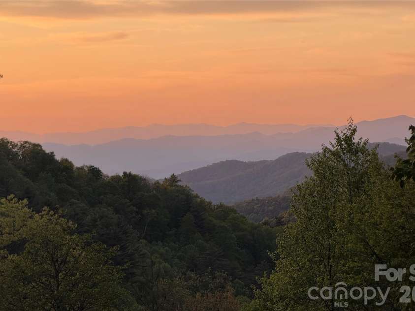 4435 Flat Mountain Road, Highlands, NC 28741.  MLS# CAR4402768, YatesRealty ID 36981. View from the kitchen, living room and back deck.