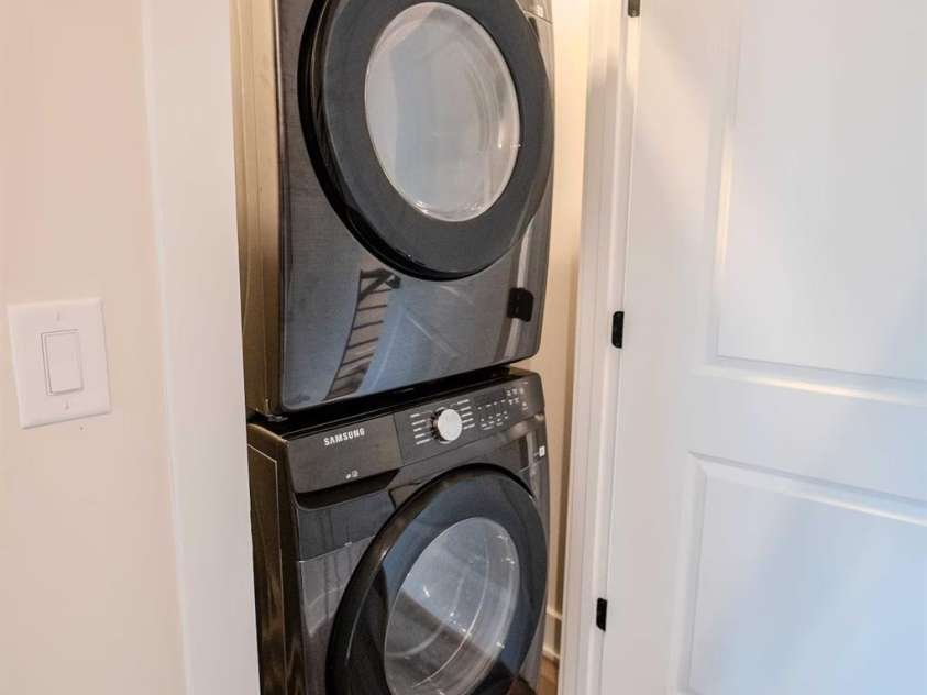 3023 Jolene Court, Charlotte, NC 28206.  MLS# CAR4399179, YatesRealty ID 36983. A conveniently located in-unit stacked washer and dryer maximize space while providing everyday convenience and efficiency.