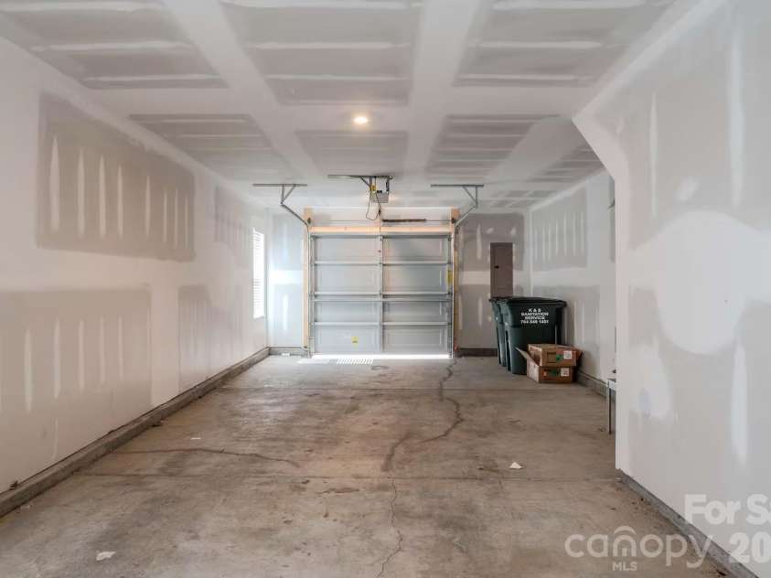 3019 Jolene Court, Charlotte, NC 28206.  MLS# CAR4399234, YatesRealty ID 36984. The oversized two-car tandem garage provides ample space for parking, additional storage, a home gym, or hobby area, offering exceptional flexibility to fit your lifestyle.