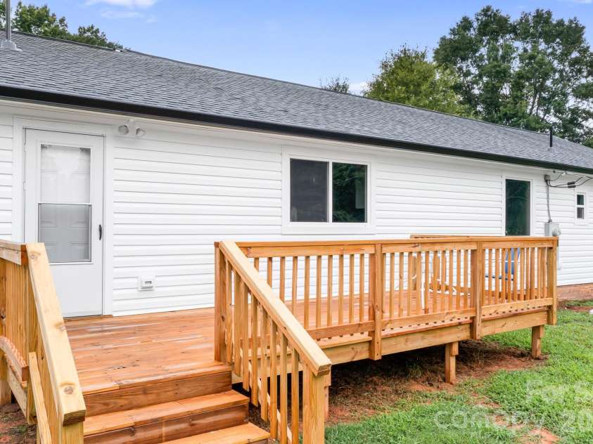 3388 Rhyne Forest Road, Iron Station, NC 28080.  MLS# CAR4402523, YatesRealty ID 36990. Back deck
