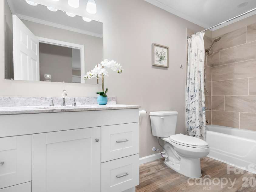 3388 Rhyne Forest Road, Iron Station, NC 28080.  MLS# CAR4402523, YatesRealty ID 36990. Hallway bathroom