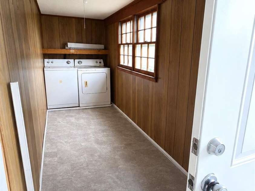304 Bleachery Court, Concord, NC 28025.  MLS# CAR4386900, YatesRealty ID 36992. Large Laundry room.