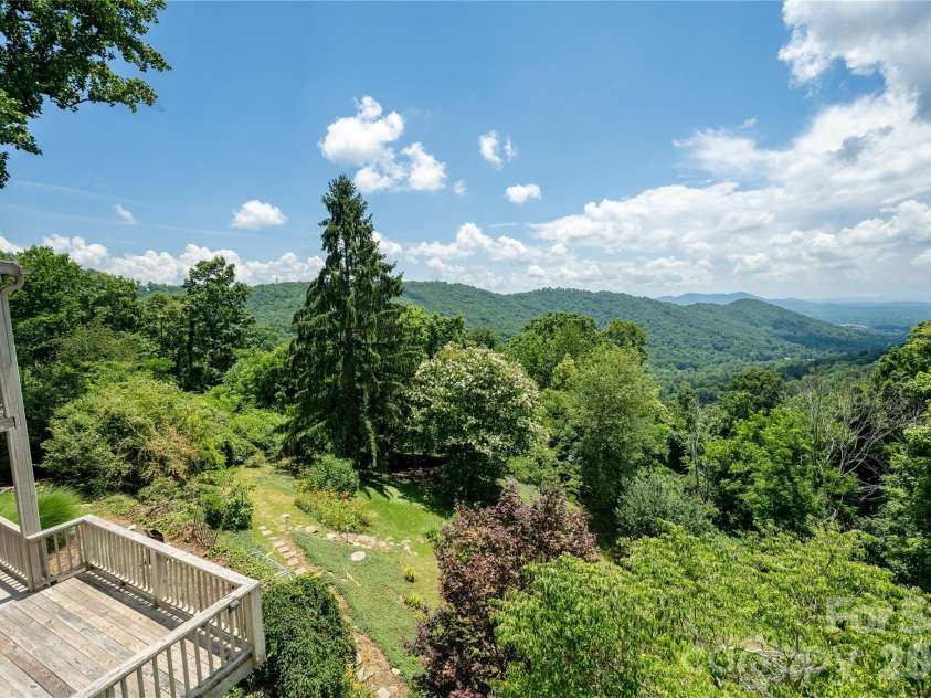 811 Town Mountain Road, Asheville, NC 28804.  MLS# CAR4401044, YatesRealty ID 36993. Usable backyard