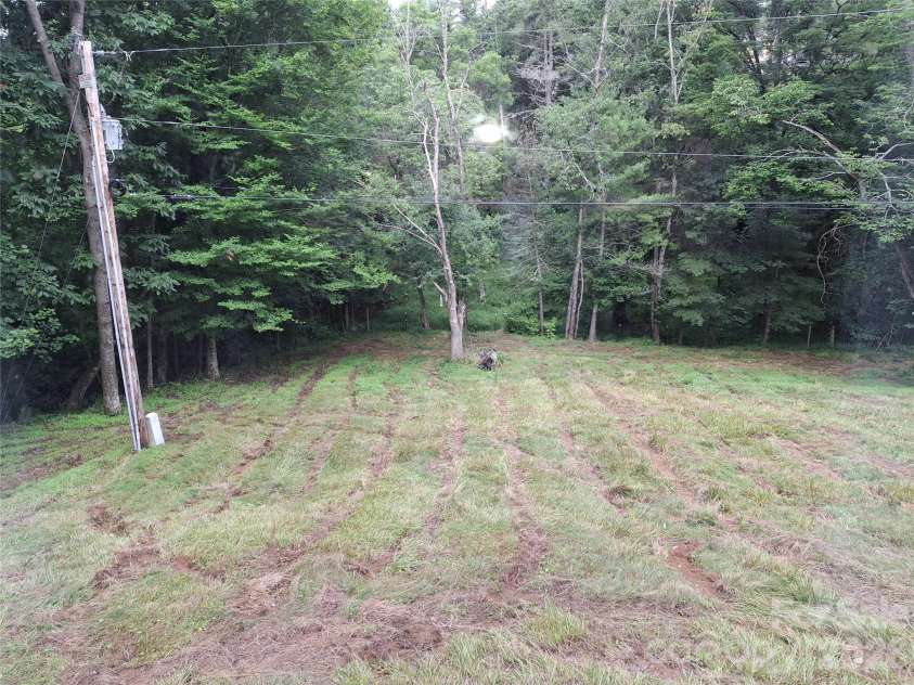 232 Tilson Drive, Mars Hill, NC 28754.  MLS# CAR4403424, YatesRealty ID 36994. Backyard