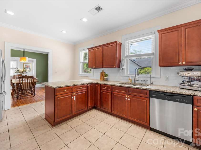 218 Winburn Street, Monroe, NC 28112.  MLS# CAR4399866, YatesRealty ID 36999. Kitchen flows nicely into Dining Room.
