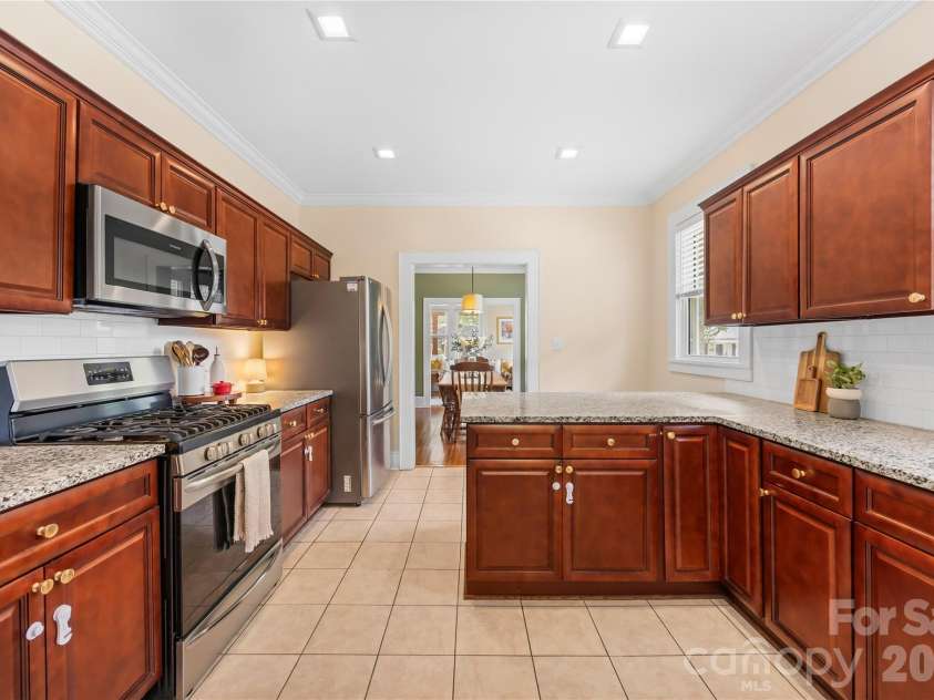 218 Winburn Street, Monroe, NC 28112.  MLS# CAR4399866, YatesRealty ID 36999. Kitchen has plenty of cabinets and counter space for the chef in your life!