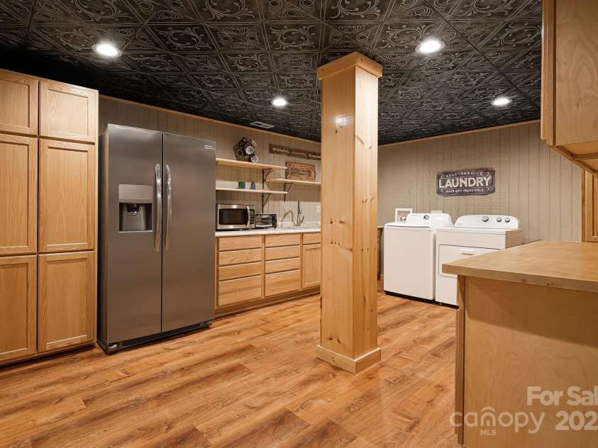 3695 Hwy 9 Highway, Mill Spring, NC 28756.  MLS# CAR4235096, YatesRealty ID 3700. Downstairs Partial Downstairs Kitchen with Large Laundry Room
