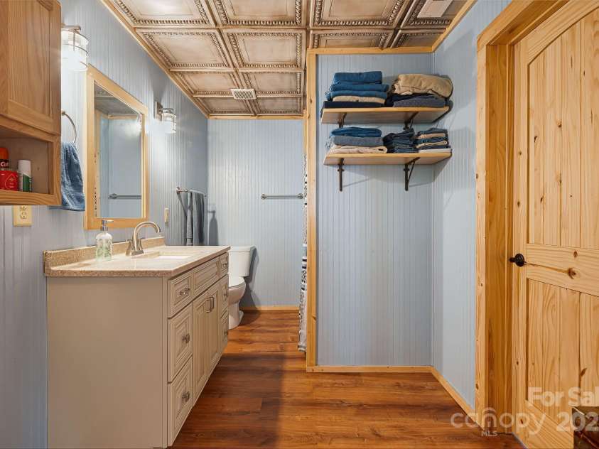 3695 Hwy 9 Highway, Mill Spring, NC 28756.  MLS# CAR4235096, YatesRealty ID 3700. Fourth Bathroom downstairs