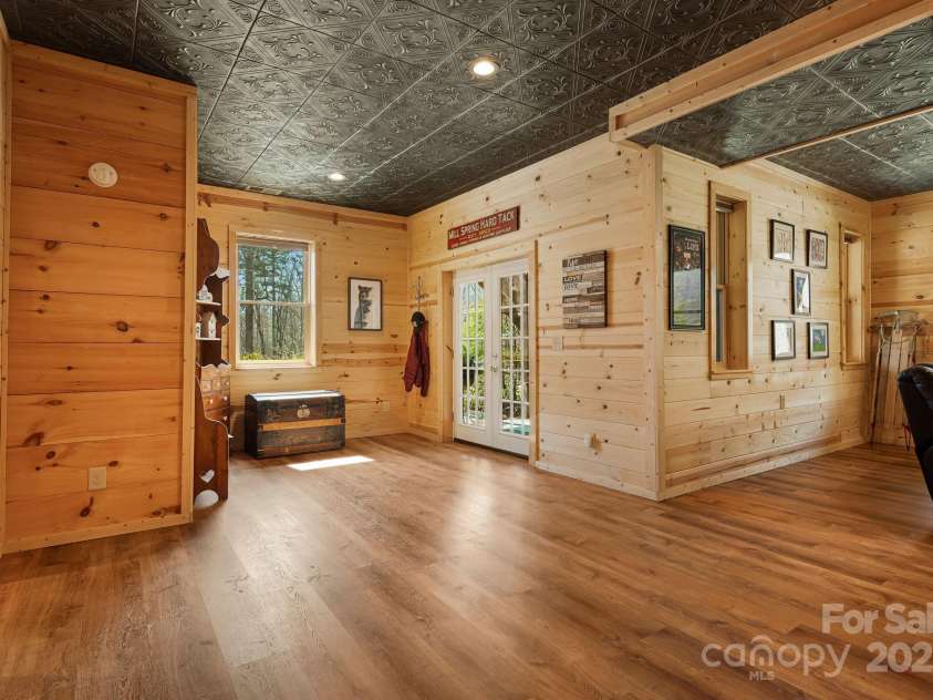 3695 Hwy 9 Highway, Mill Spring, NC 28756.  MLS# CAR4235096, YatesRealty ID 3700. Large downstairs with beautiful double french door entrance and exit onto the lower patio