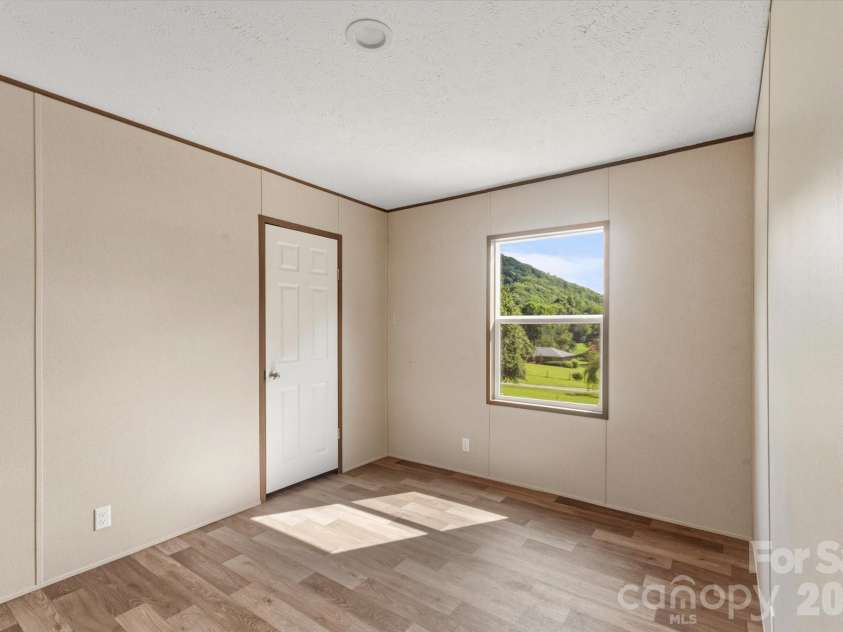 135 Jack Taylor Road, Marion, NC 28752.  MLS# CAR4399296, YatesRealty ID 37006. 