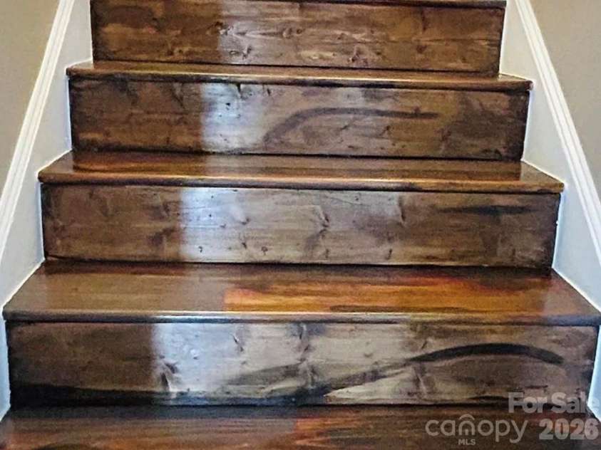 9126 Providence Road, Waxhaw, NC 28173.  MLS# CAR4402899, YatesRealty ID 37012. Stairs to upper apartment