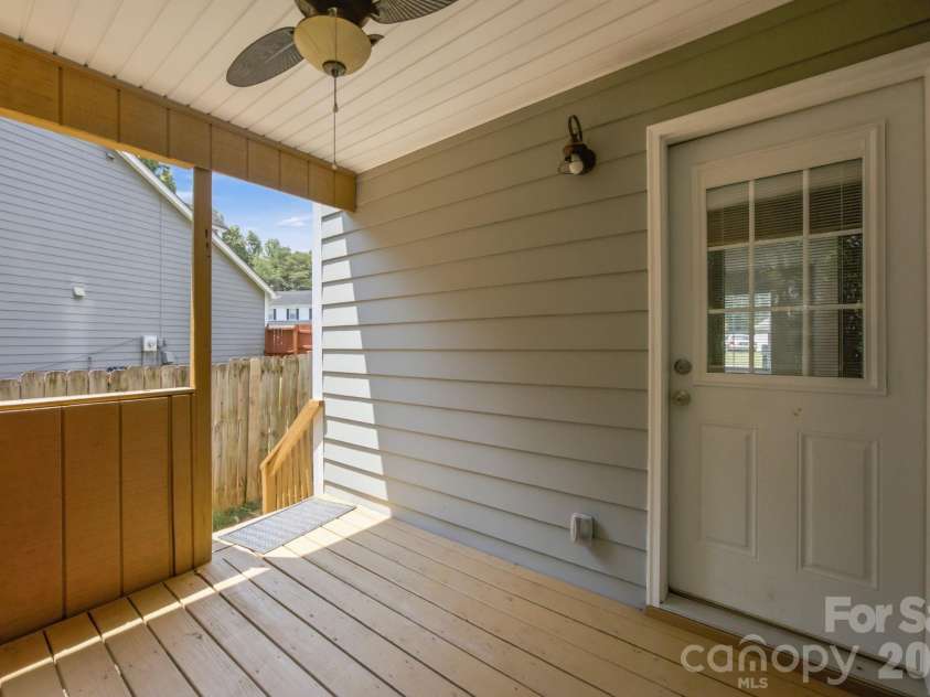 8313 Houndstooth Drive, Charlotte, NC 28227.  MLS# CAR4401386, YatesRealty ID 37018. Covered Back Porch