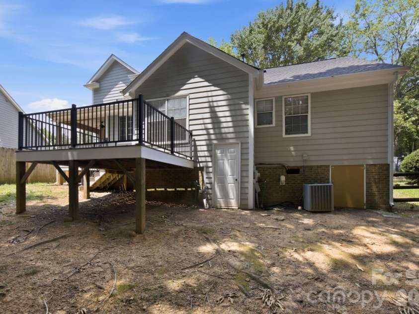 8313 Houndstooth Drive, Charlotte, NC 28227.  MLS# CAR4401386, YatesRealty ID 37018. Exterior/ Deck View