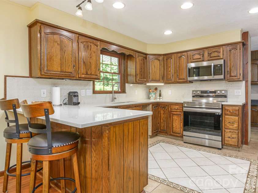 111 Kindy Forest Drive, Hendersonville, NC 28739.  MLS# CAR4398408, YatesRealty ID 37029. 