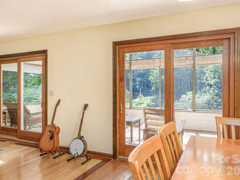 111 Kindy Forest Drive, Hendersonville, NC 28739.  MLS# CAR4398408, YatesRealty ID 37029. DBL Sliders to the Deck