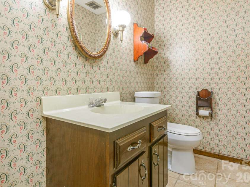 111 Kindy Forest Drive, Hendersonville, NC 28739.  MLS# CAR4398408, YatesRealty ID 37029. Downstairs 1/2 Bath