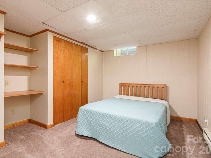 111 Kindy Forest Drive, Hendersonville, NC 28739.  MLS# CAR4398408, YatesRealty ID 37029. Downstairs Bonus Room